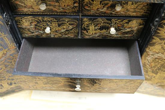 A Regency Japanned chinoiserie cabinet
